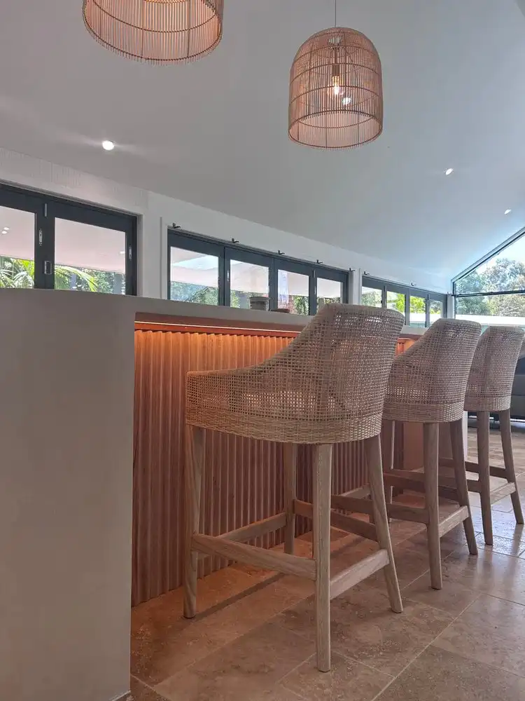 Wicker bar stools with pendant lights